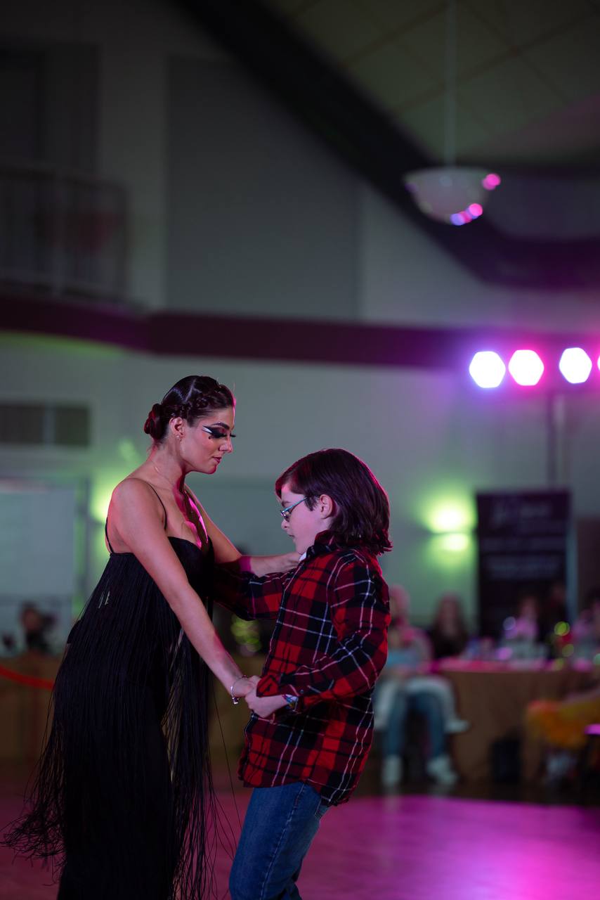 Dance partners connecting during an inclusive event performance