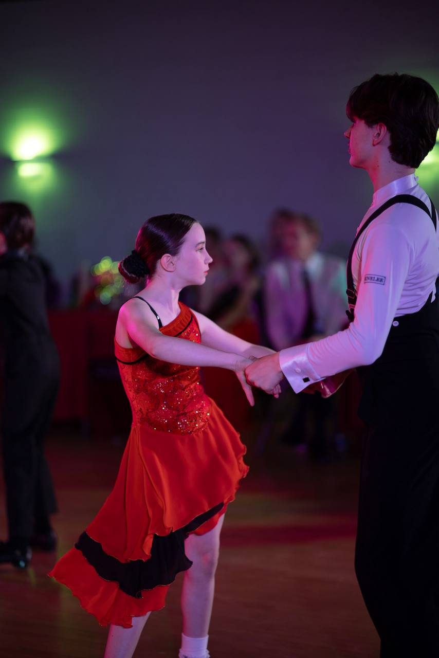 Adults enjoying a ballroom dance class